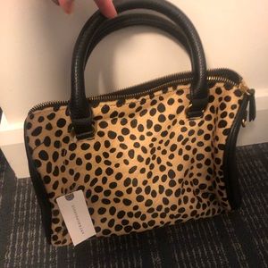 NWT — Anthropology cheetah print cross body bag.